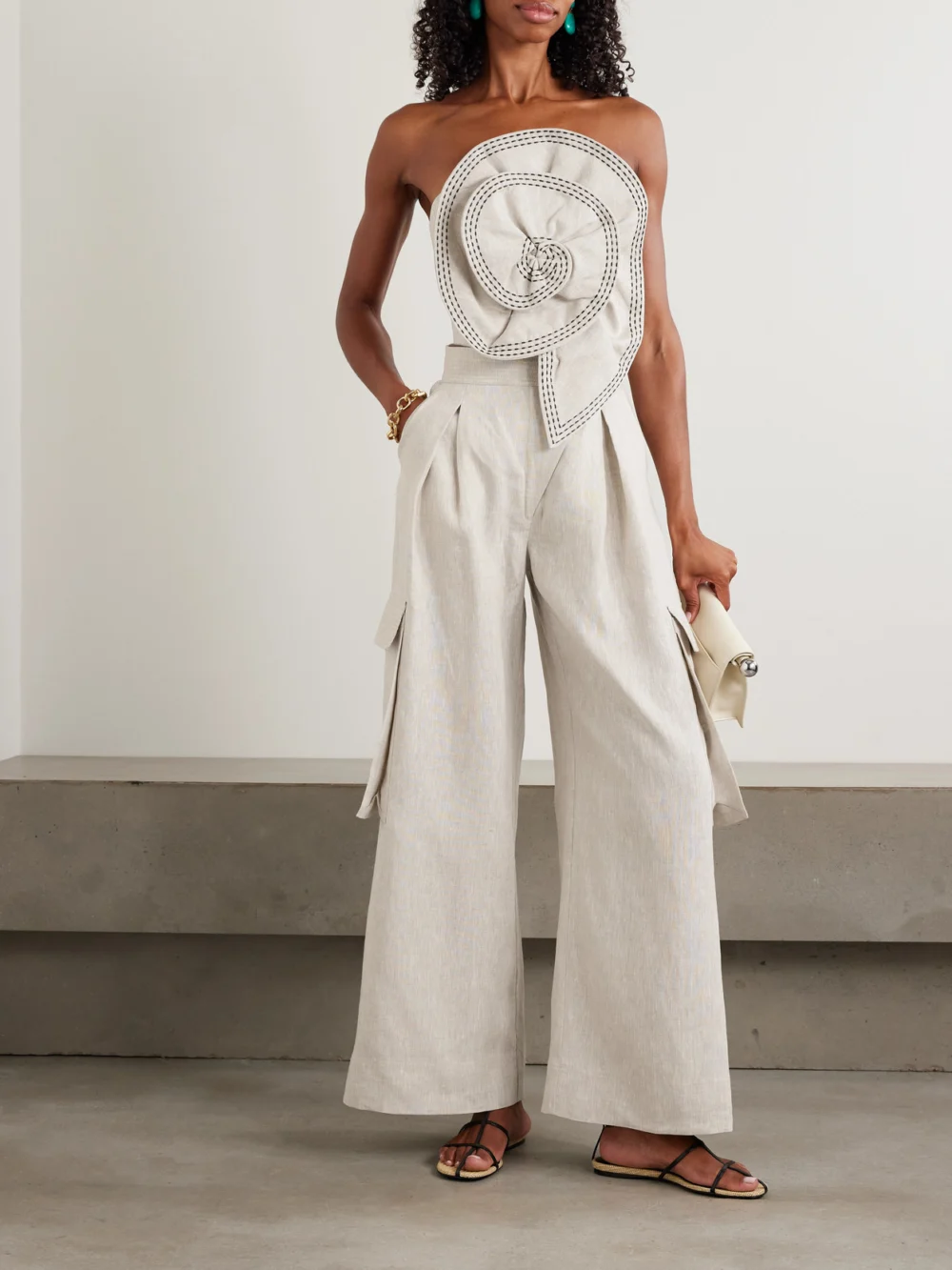 Andres Otalora Cropped Appliquéd Topstitched Linen Bustier Top, worn by a model