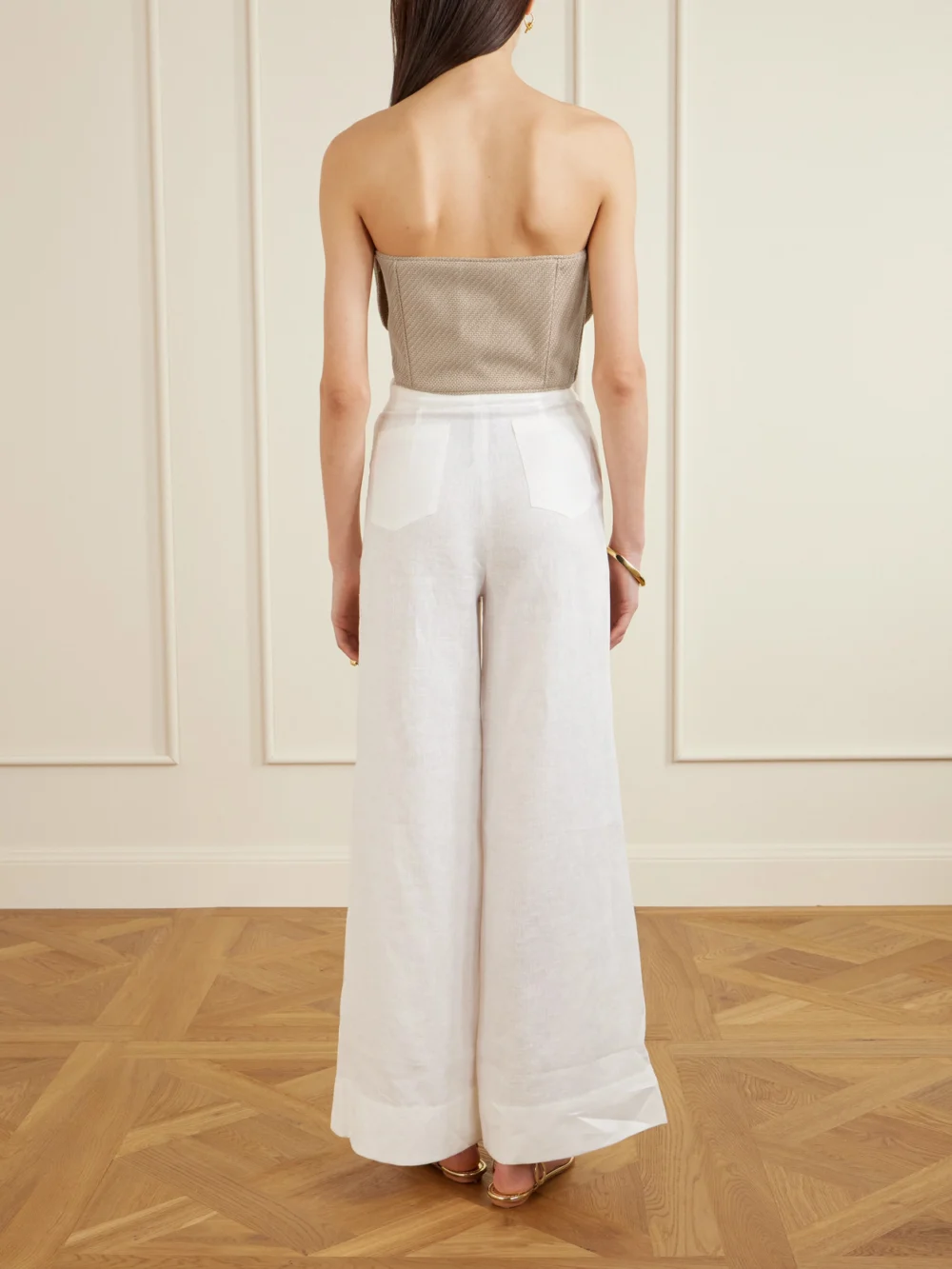 Back view of the Andres Otalora Florencia Appliquéd Strapless Cropped Woven Top