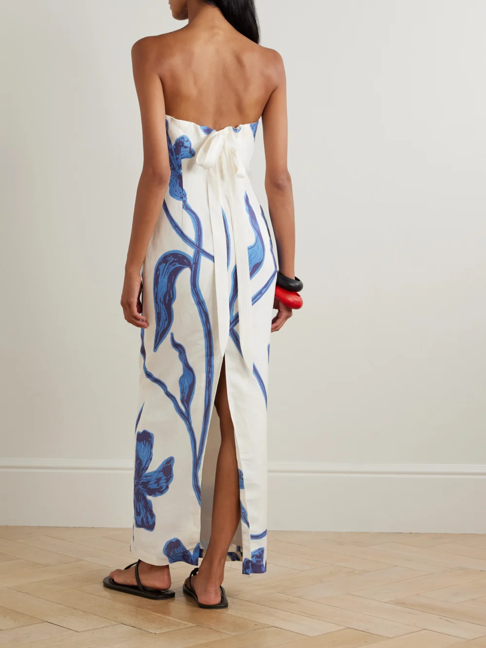 Back view of the Andres Otalora Nosso Amor Strapless Floral-print Linen Maxi Dress
