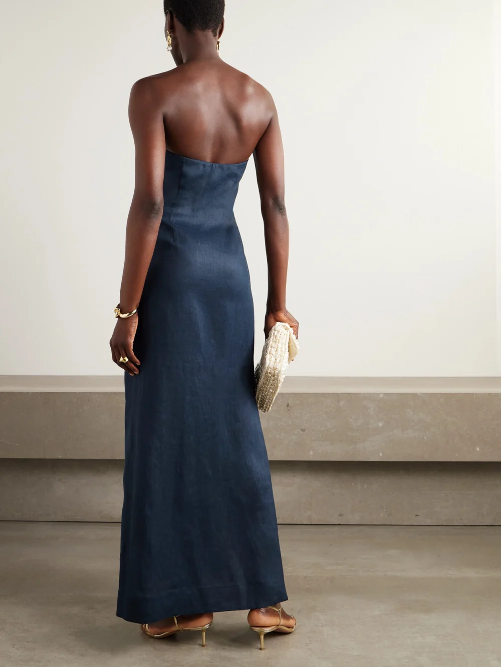 Back view of the Andres Otalora Tactos Strapless Embroidered Appliquéd Linen Maxi Dress