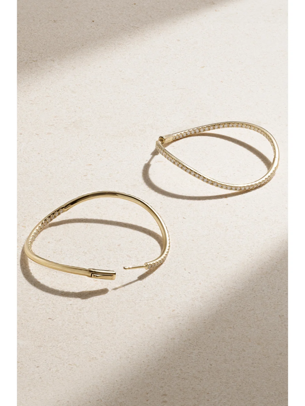 Close-up detail of the Anita Ko Twisted 18-karat Gold Diamond Hoop Earrings