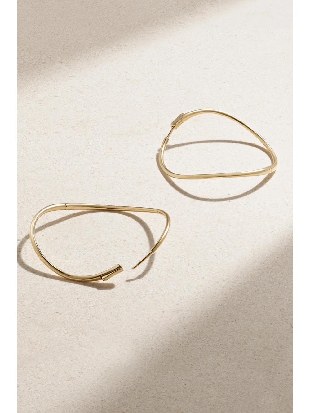 Close-up detail of the Anita Ko Twisted 18-karat Gold Hoop Earrings