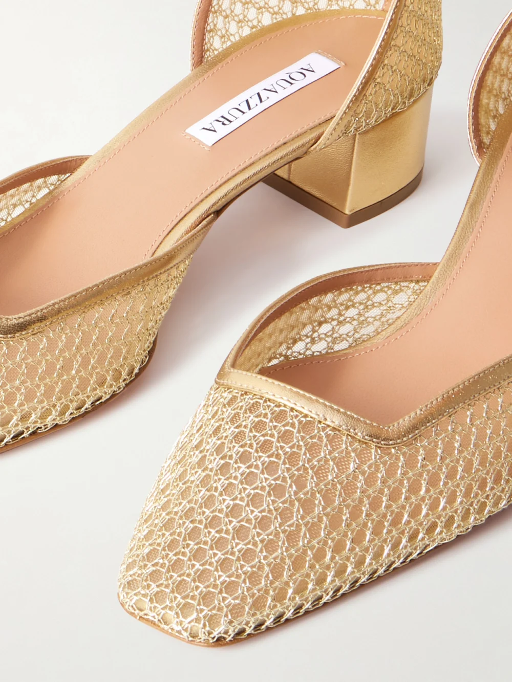 Close-up detail of the Aquazzura Asha 35 Leather-trimmed Metallic Mesh Pumps