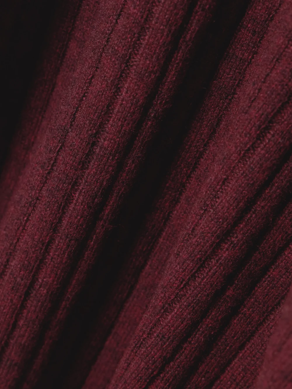 Close-up detail of the Arch4 Ariana Ribbed Cashmere Turtleneck Sweater