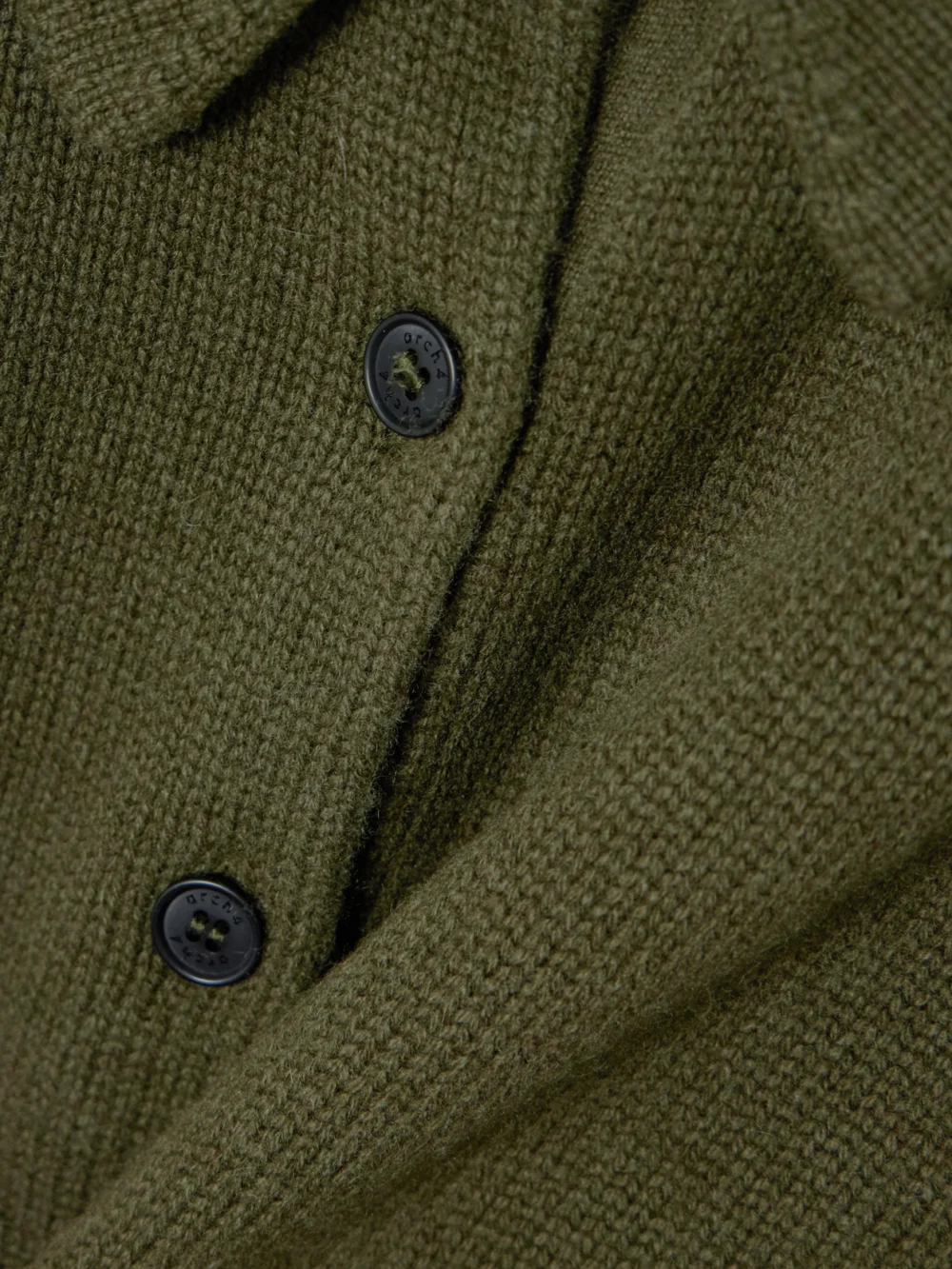 Close-up detail of the Arch4 Bessi Cashmere Polo Sweater