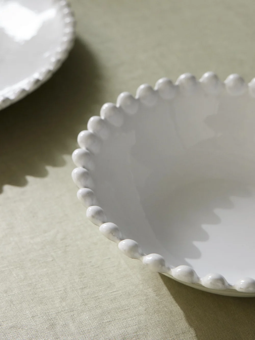 Close-up detail of the Astier De Villatte Adélaïde Small Ceramic Soup Plate