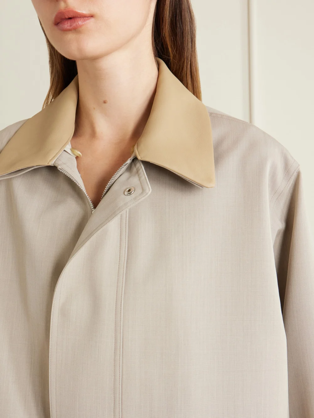 Close-up detail of the Auralee Leather-trimmed Wool-canvas Jacket