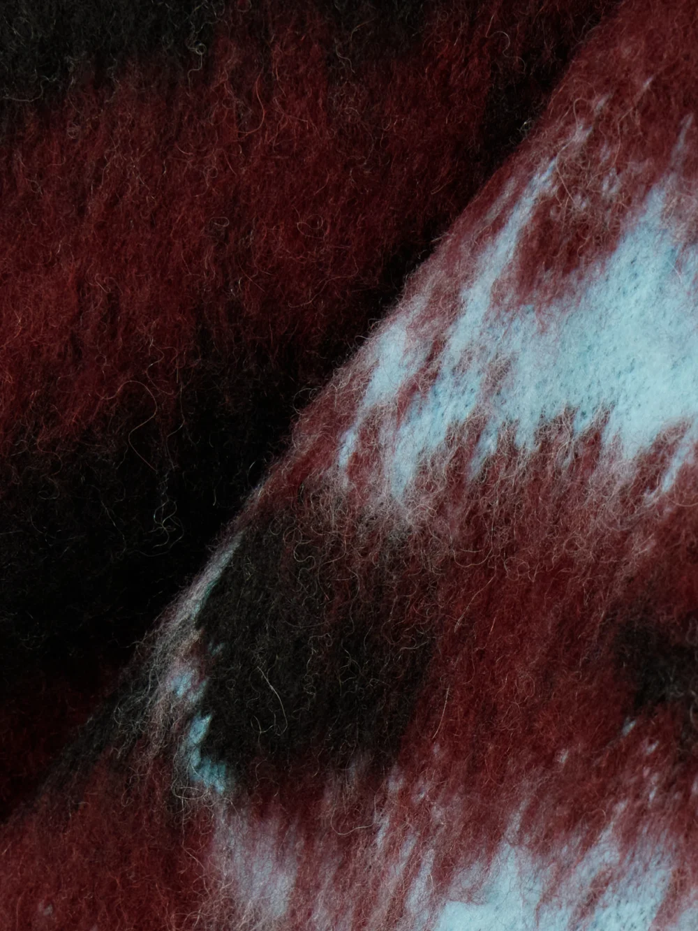 Close-up detail of the Aztech Mountain Off Piste Shell-trimmed Printed Fleece Hoodie