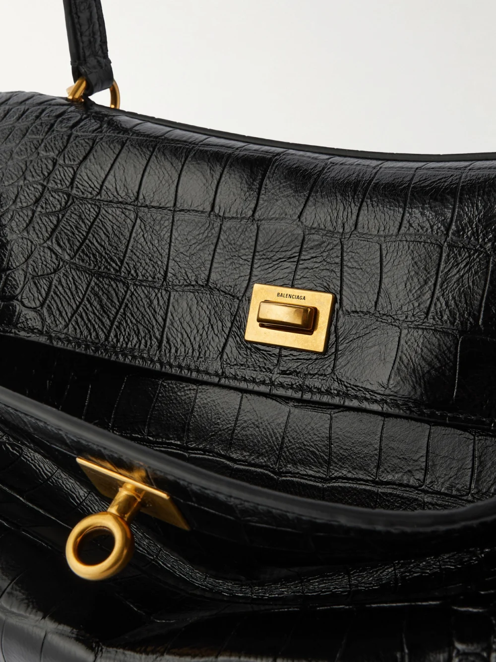 Close-up detail of the Balenciaga Rodeo Medium Croc-effect Leather Shoulder Bag