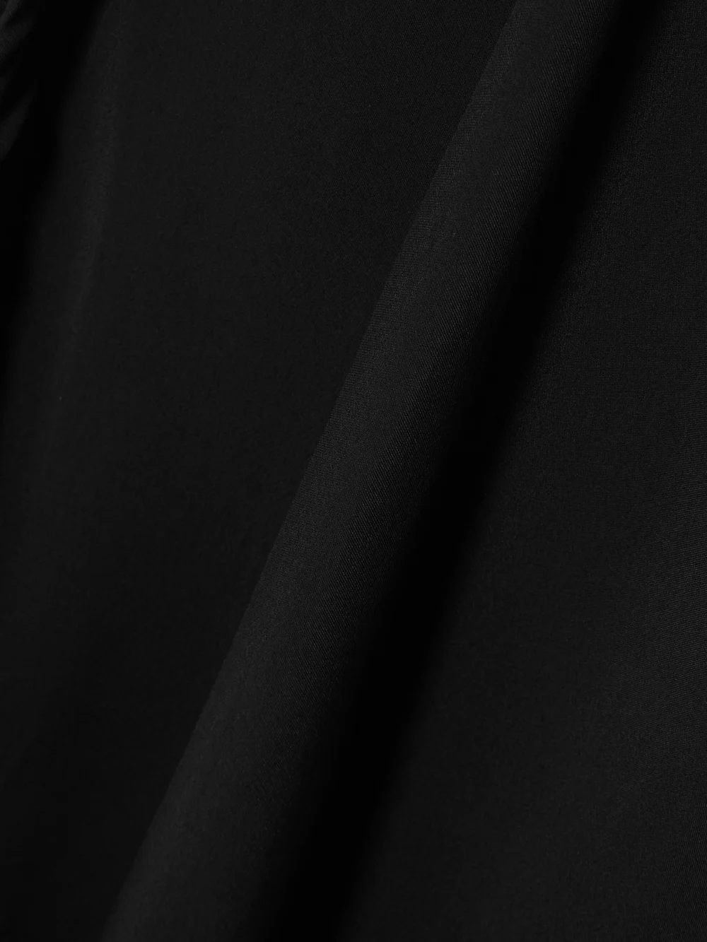 Close-up detail of the Bernadette Clara Draped Crepe Gown