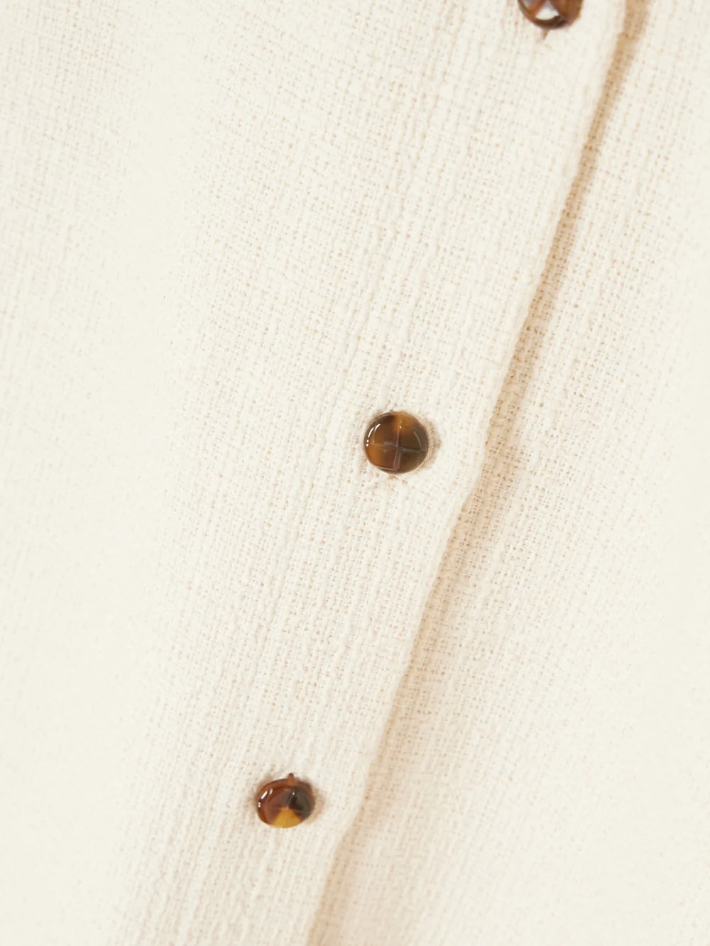 Close-up detail of the BLAZÉ Milano Missy Appaloosa Cotton-blend Tweed Mini Skirt