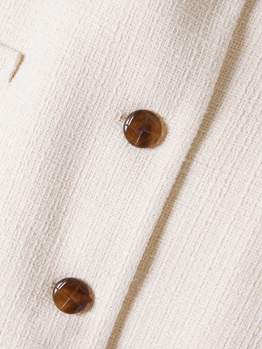 Close-up detail of the BLAZÉ Milano Missy Gliss Cotton-blend Tweed Jacket