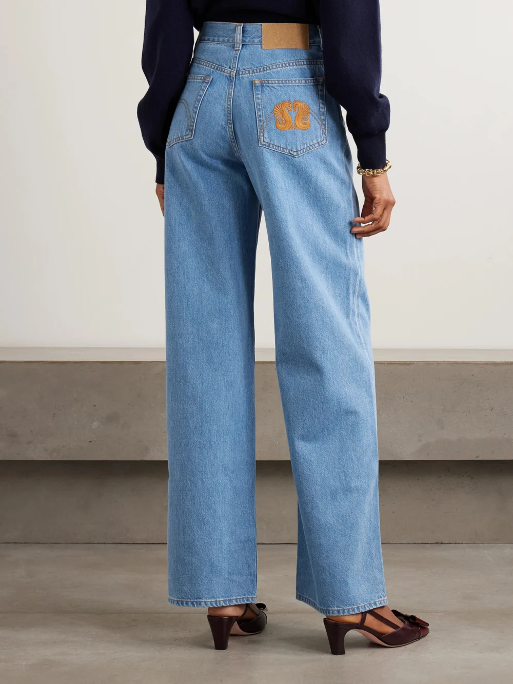 Back view of the BLAZÉ Milano Nariida Java Embroidered High-rise Wide-leg Jeans