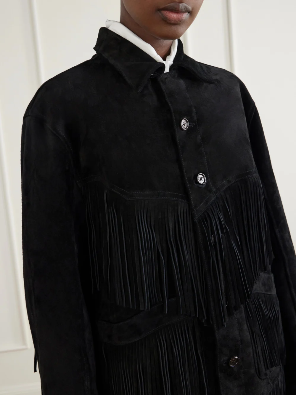 Close-up detail of the Bode Appalachian Fringed Suede Jacket