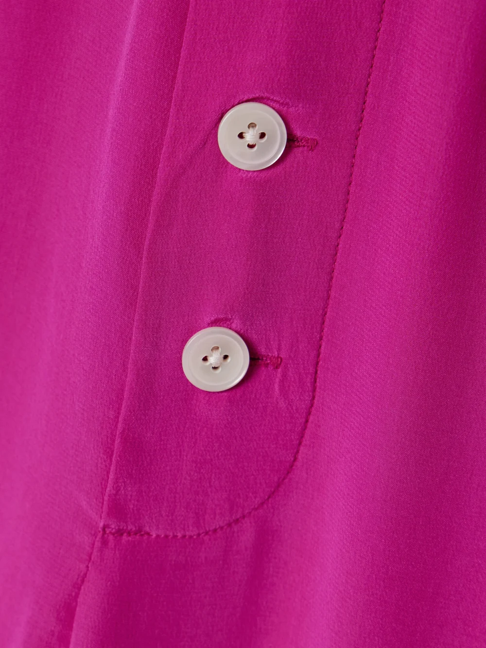 Close-up detail of the Bode Jasmine Silk-charmeuse Pants