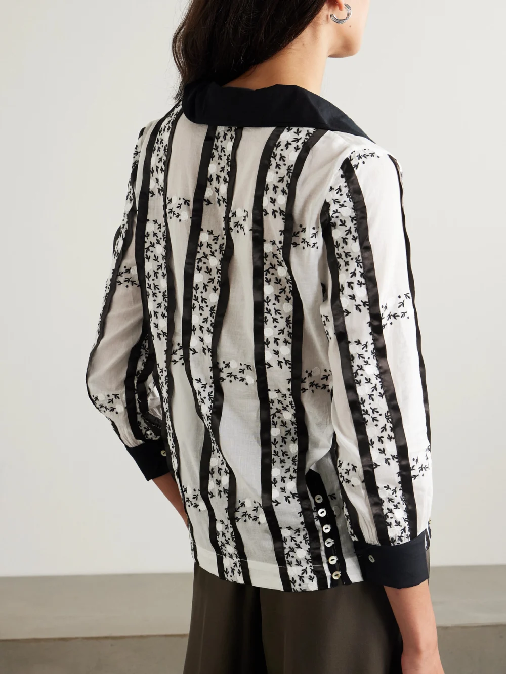 Back view of the Bode Lattice Sprig Embroidered Button-embellished Satin-trimmed Cotton Blouse