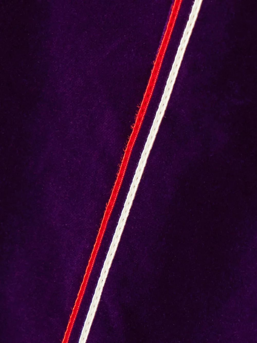 Close-up detail of the Bode Showcase Striped Cotton-velvet Straight-leg Pants