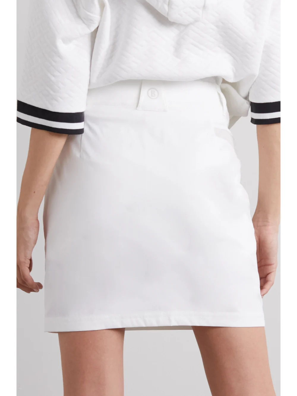 Back view of the Bogner Mirana Shell Mini Golf Skirt