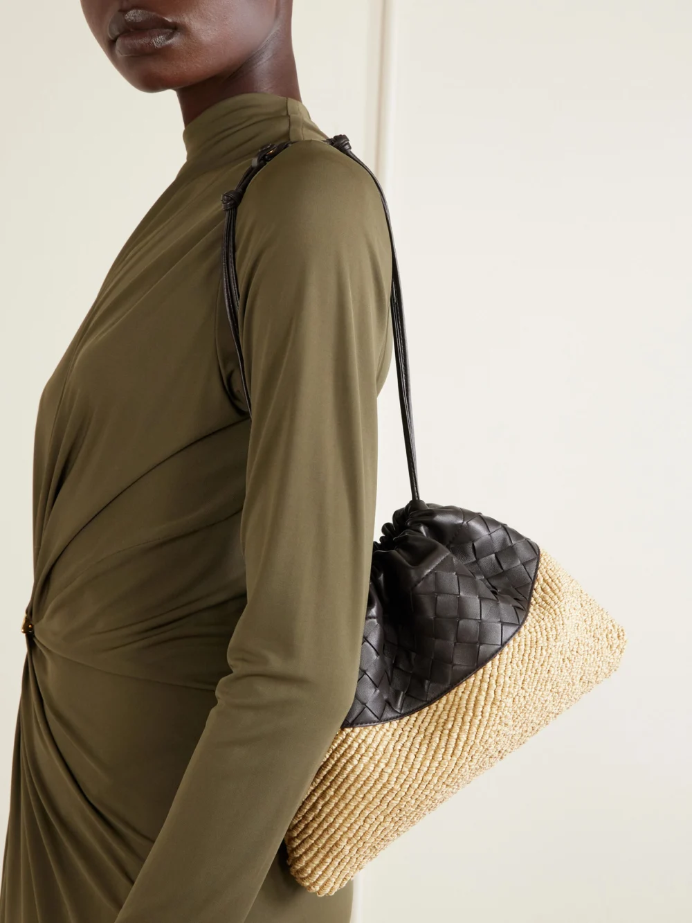 Bottega Veneta Dustbag Medium Intrecciato Leather and Raffia Clutch, styled view