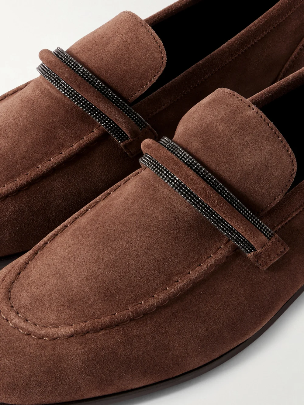 Close-up detail of the Brunello Cucinelli Bead-embellished Suede Loafers