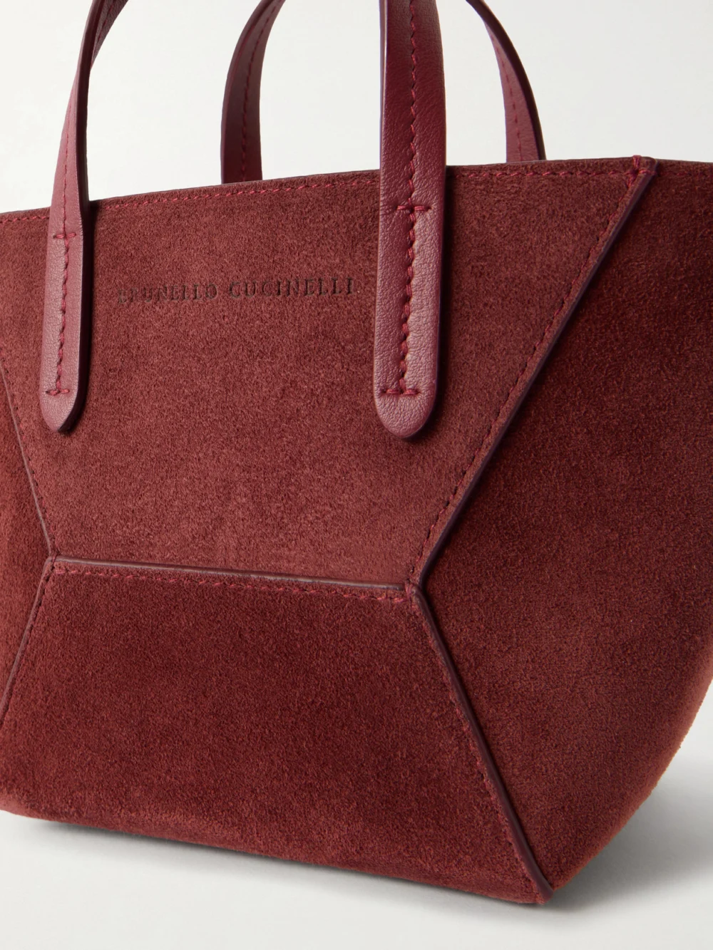 Close-up detail of the Brunello Cucinelli Embellished Suede Shoulder Bag