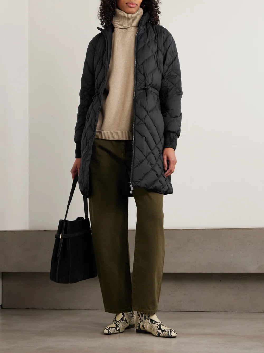 Burberry Appliquéd Leather-trimmed Padded Quilted Shell Down Jacket, worn by a model