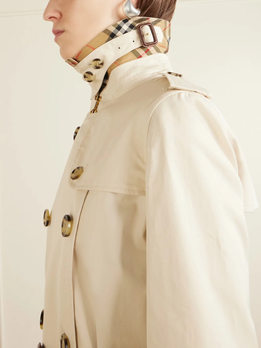 Close-up detail of the Burberry Kensington Double-breasted Belted Cotton-gabardine Trench Coat