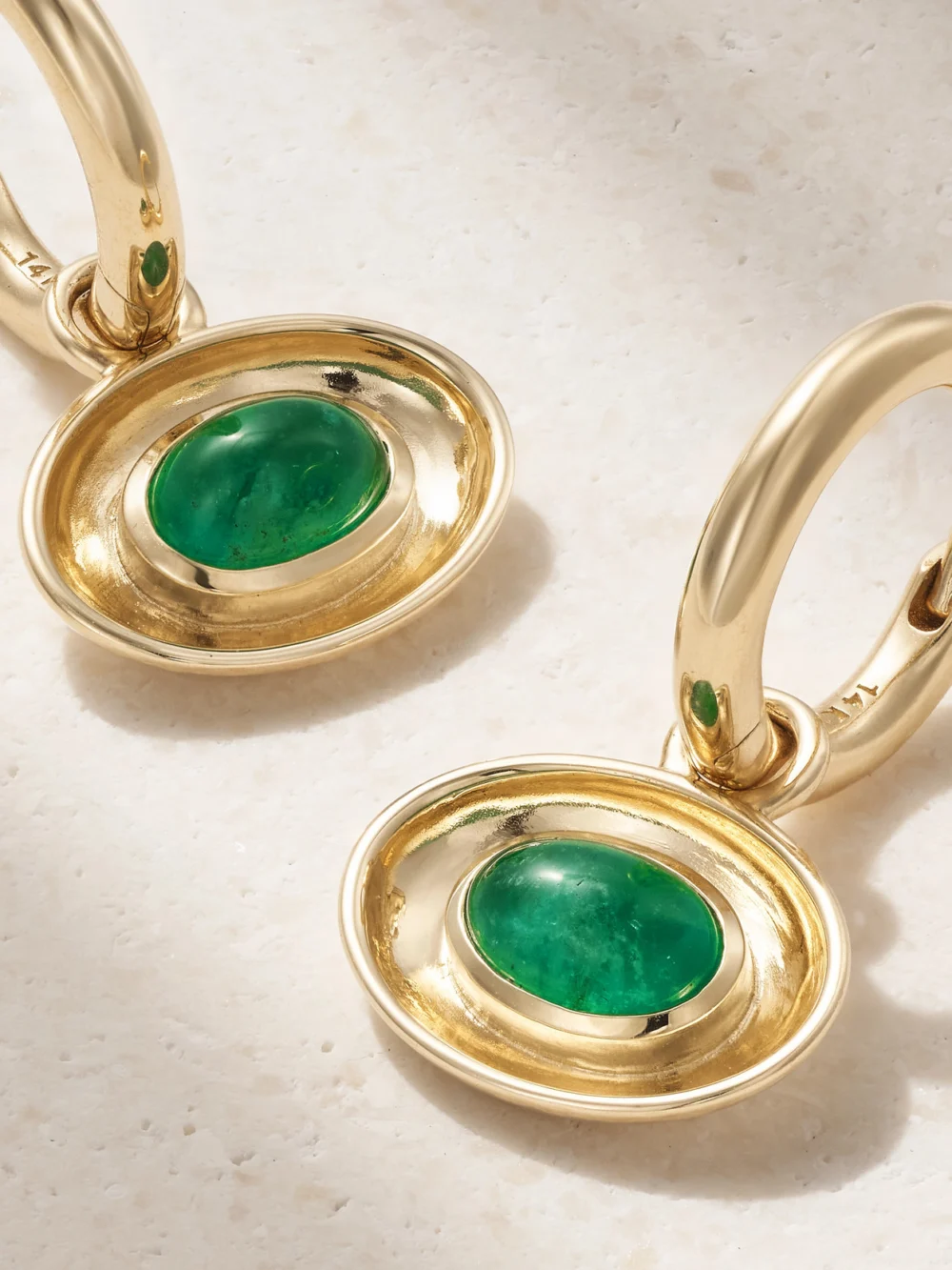 Close-up detail of the By Pariah Aurelia 14-karat Gold Emerald Hoop Earrings