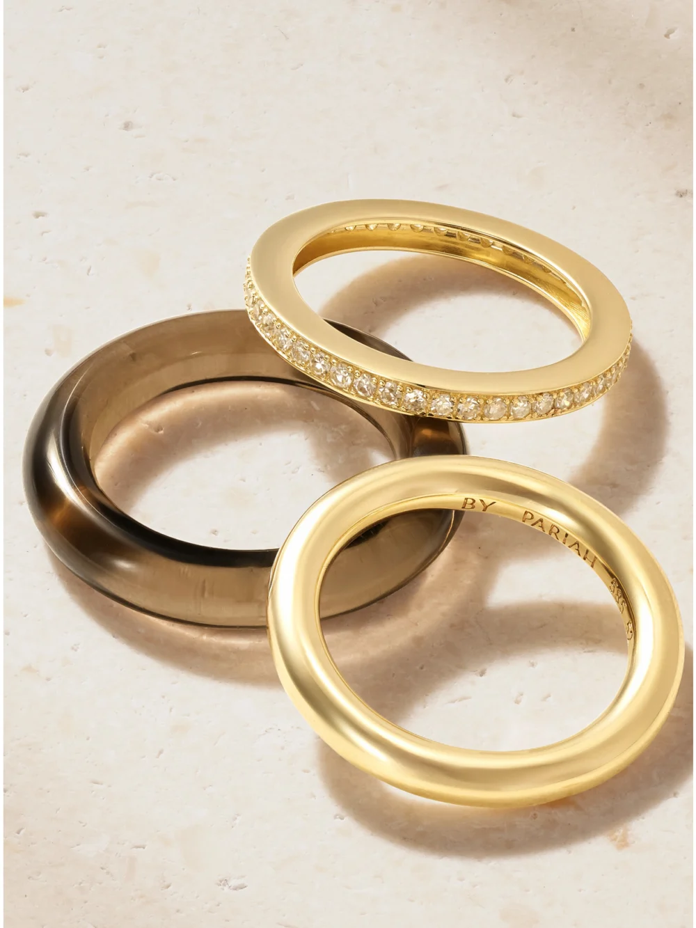 Close-up detail of the By Pariah Set of Three 14-karat Gold, Diamond and Smokey Quartz Rings