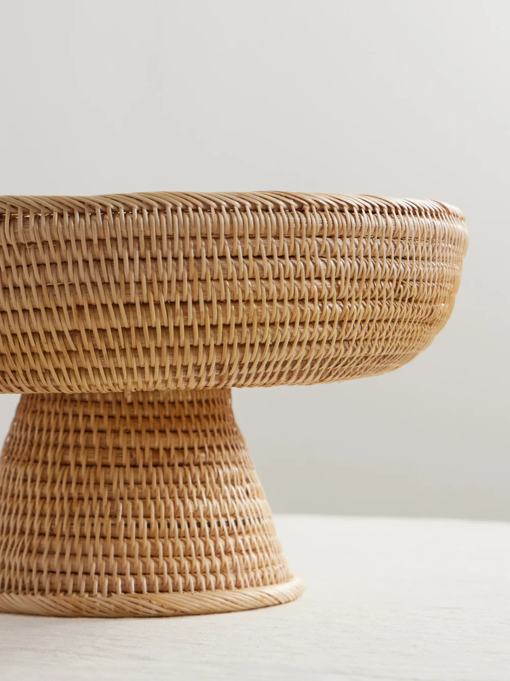Close-up detail of the Cabana Sabbia Large Rattan Fruit Stand