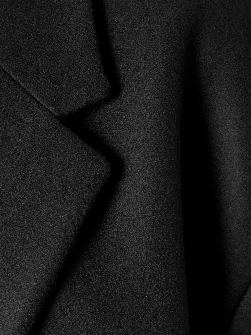 Close-up detail of the Calvin Klein Collection Beatrice Belted Wool and Cashmere-blend Coat