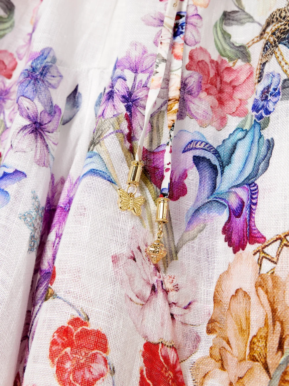 Close-up detail of the Camilla Monserrate Magic Embellished Printed Linen Tapered Pants