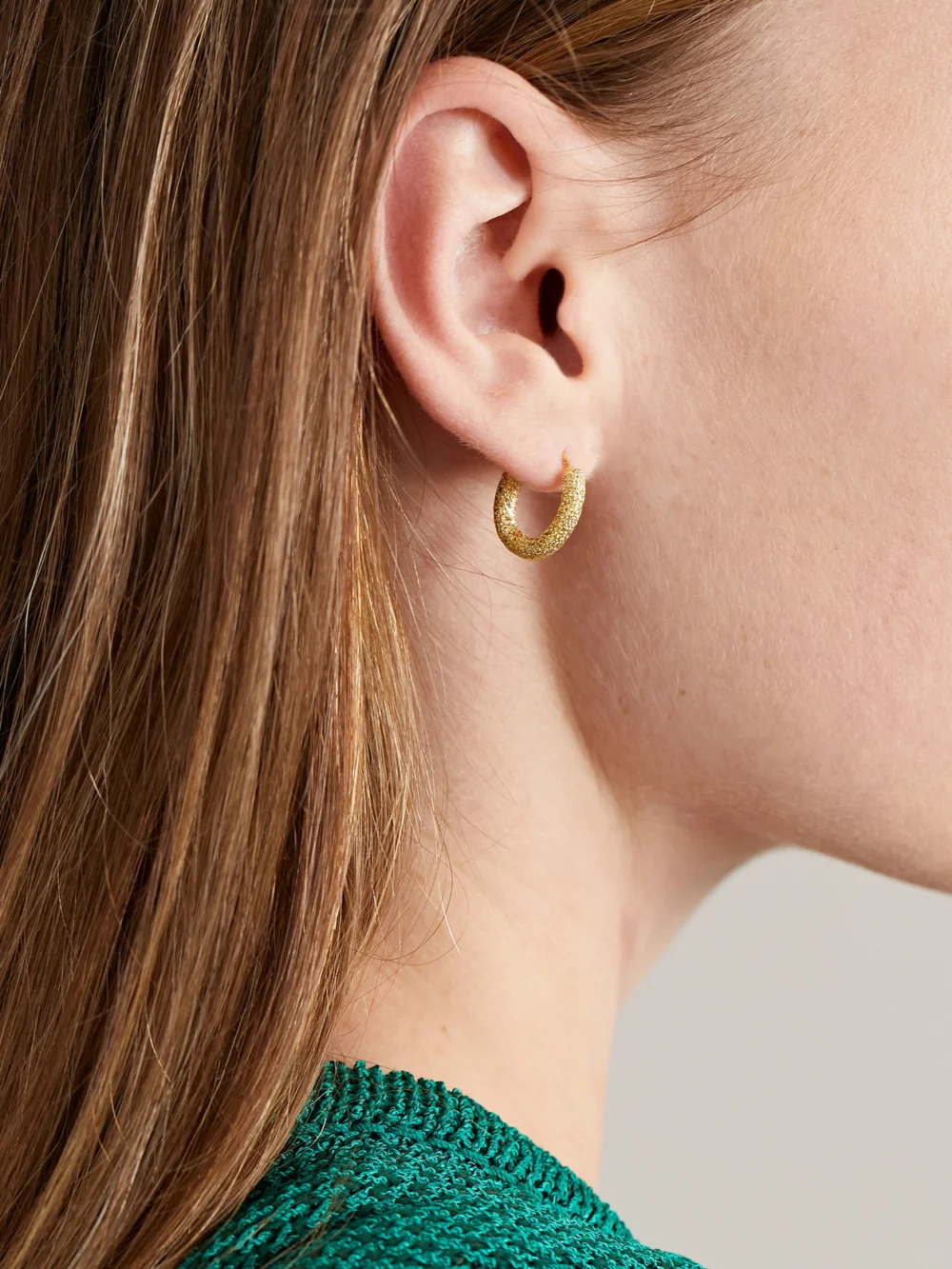 Carolina Bucci Florentine Finish 18-karat Gold Hoop Earrings, styled view