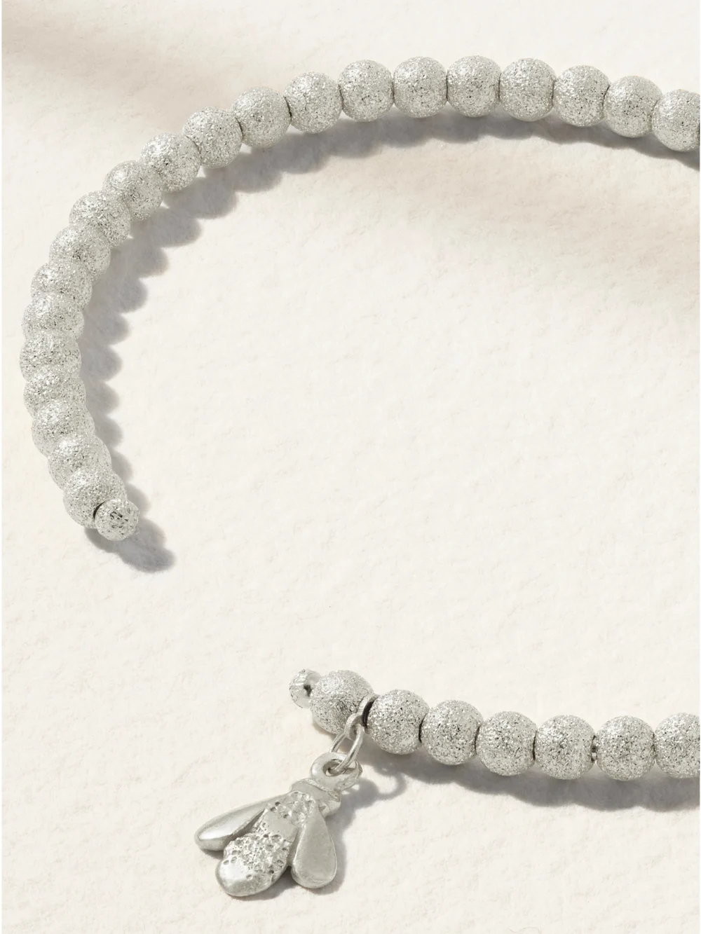 Back view of the Carolina Bucci Florentine Finish 18-karat White Gold Bracelet