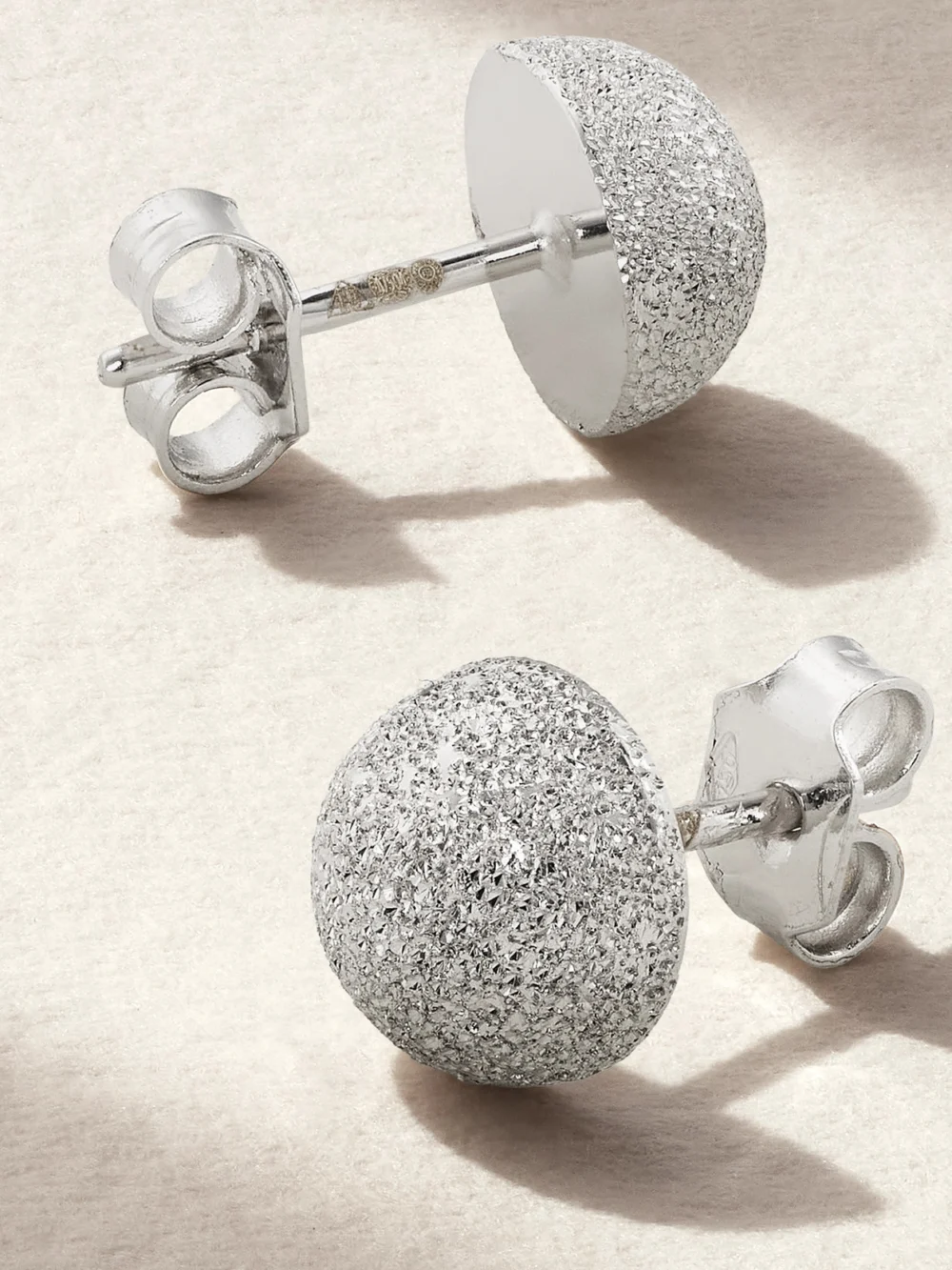 Close-up detail of the Carolina Bucci Florentine Finish Medium 18-karat White Gold Earrings