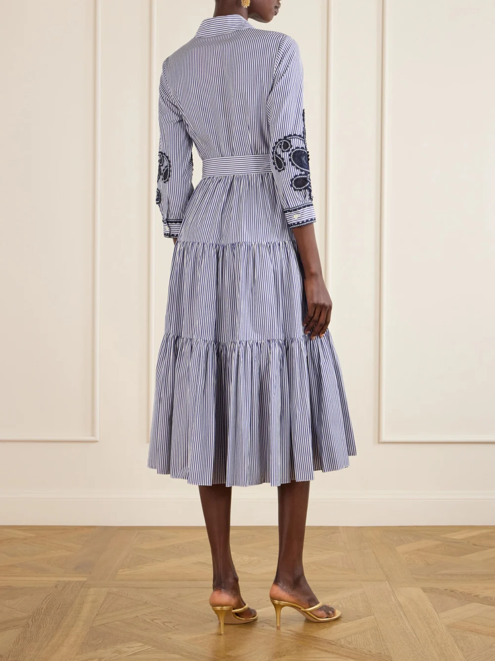 Back view of the Carolina Herrera Belted Tiered Embroidered Striped Cotton-poplin Midi Dress