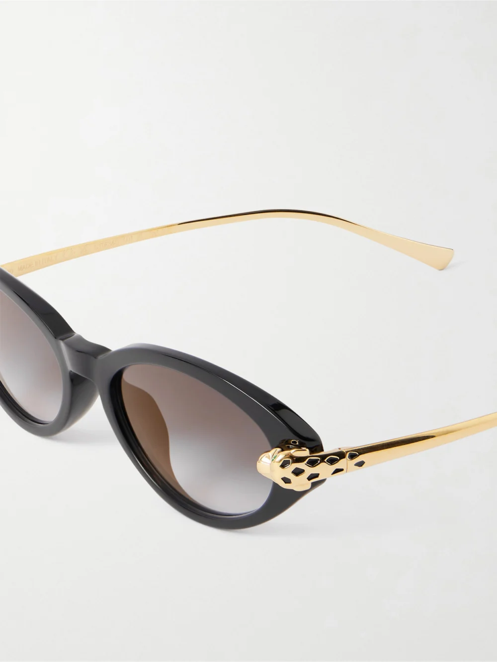 Close-up detail of the Cartier Eyewear Panthère De Cartier Oval-frame Acetate and Gold-tone Sunglasses