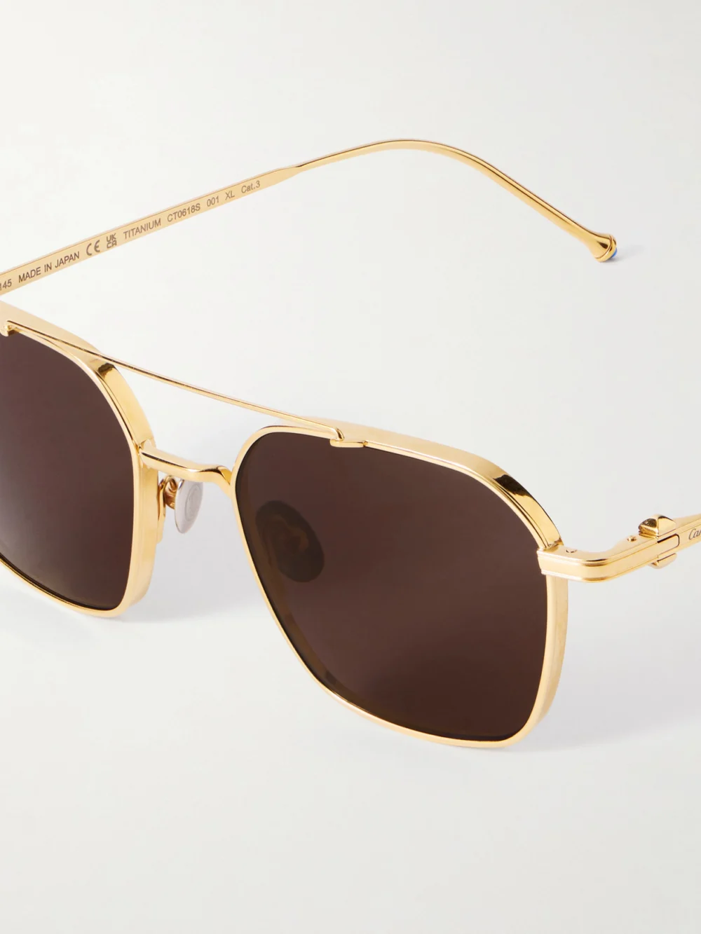 Close-up detail of the Cartier Eyewear Pasha Gold-tone Aviator-style Sunglasses