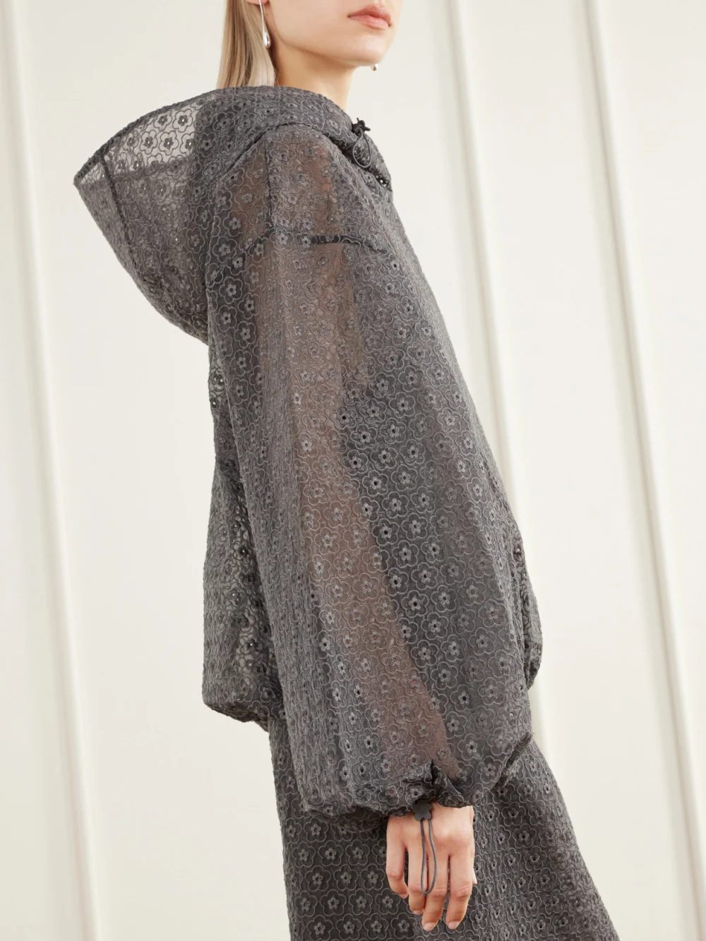 Close-up detail of the Cecilie Bahnsen Shila Hooded Drawstring Cotton-blend Floral-lace Jacket