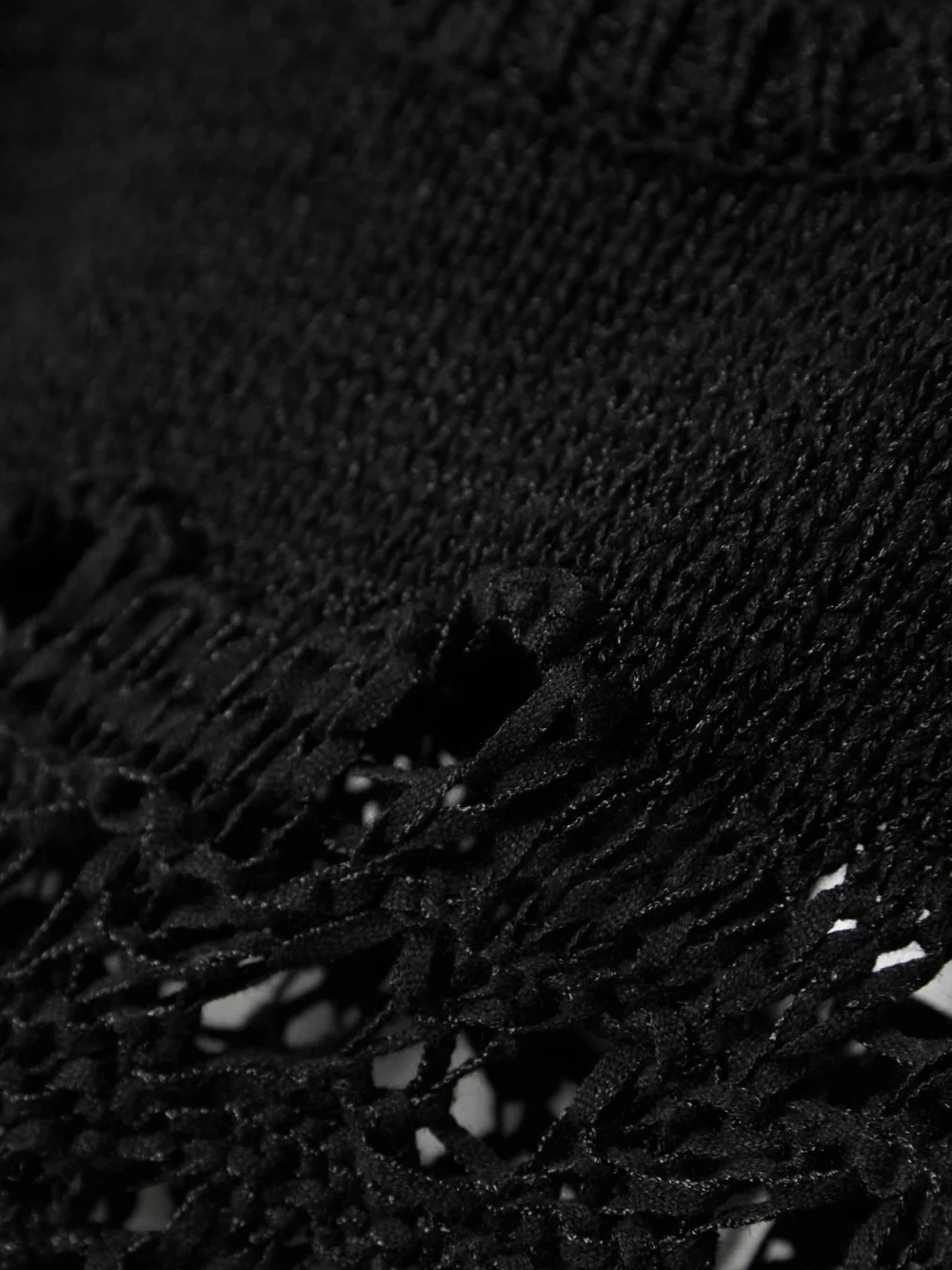 Close-up detail of the Christopher Esber Crochet-knit Cropped Top