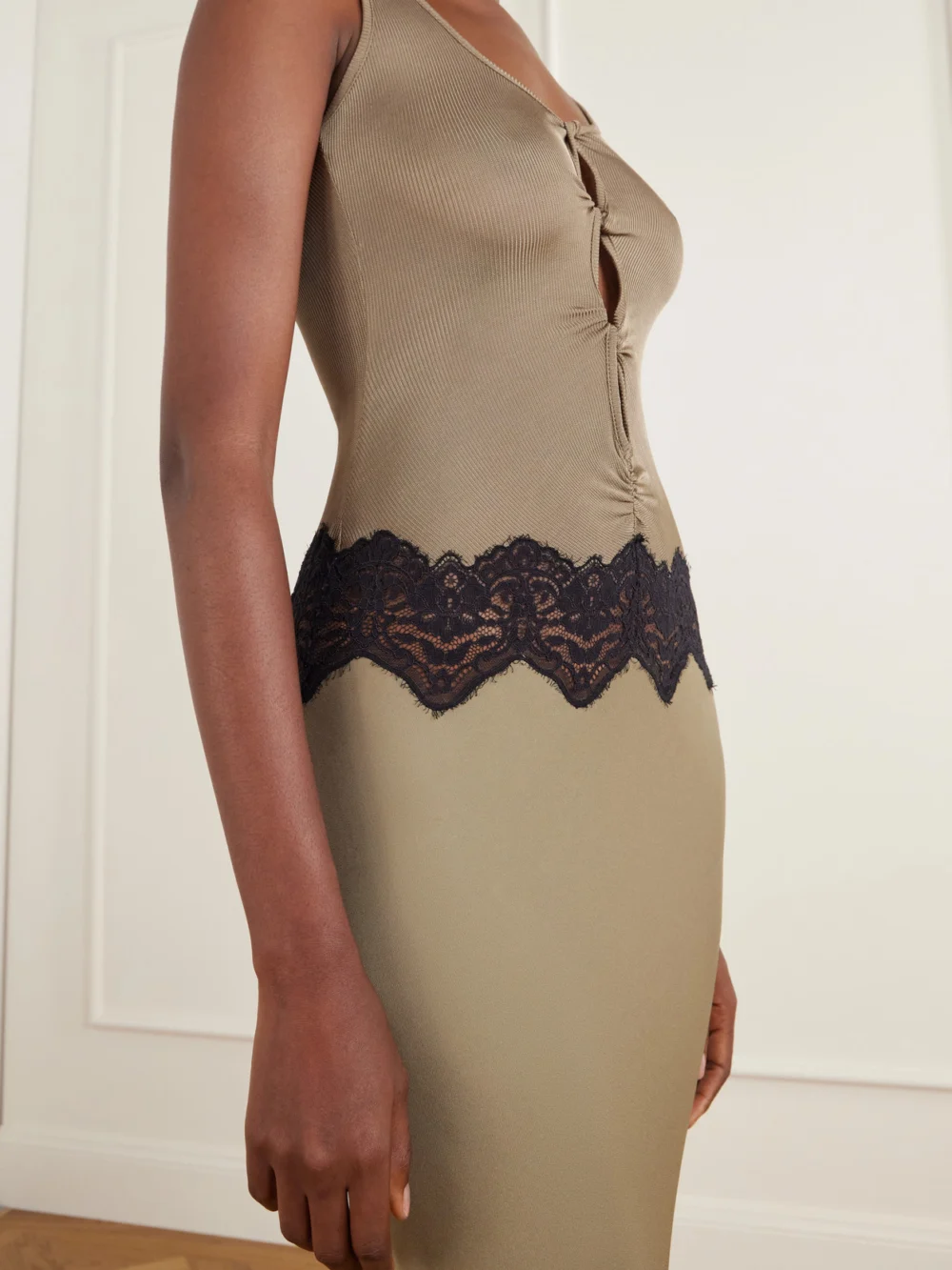 Close-up detail of the Christopher Esber Verner Cut-out Ribbed Lace-trimmed Jersey Midi Dress