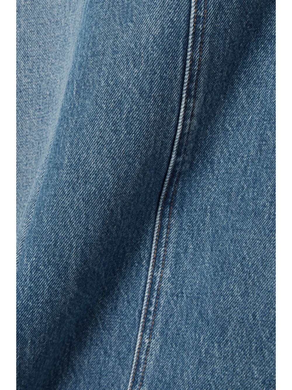 Close-up detail of the Citizens of Humanity Raian Frayed Paneled Organic Denim Midi Skirt