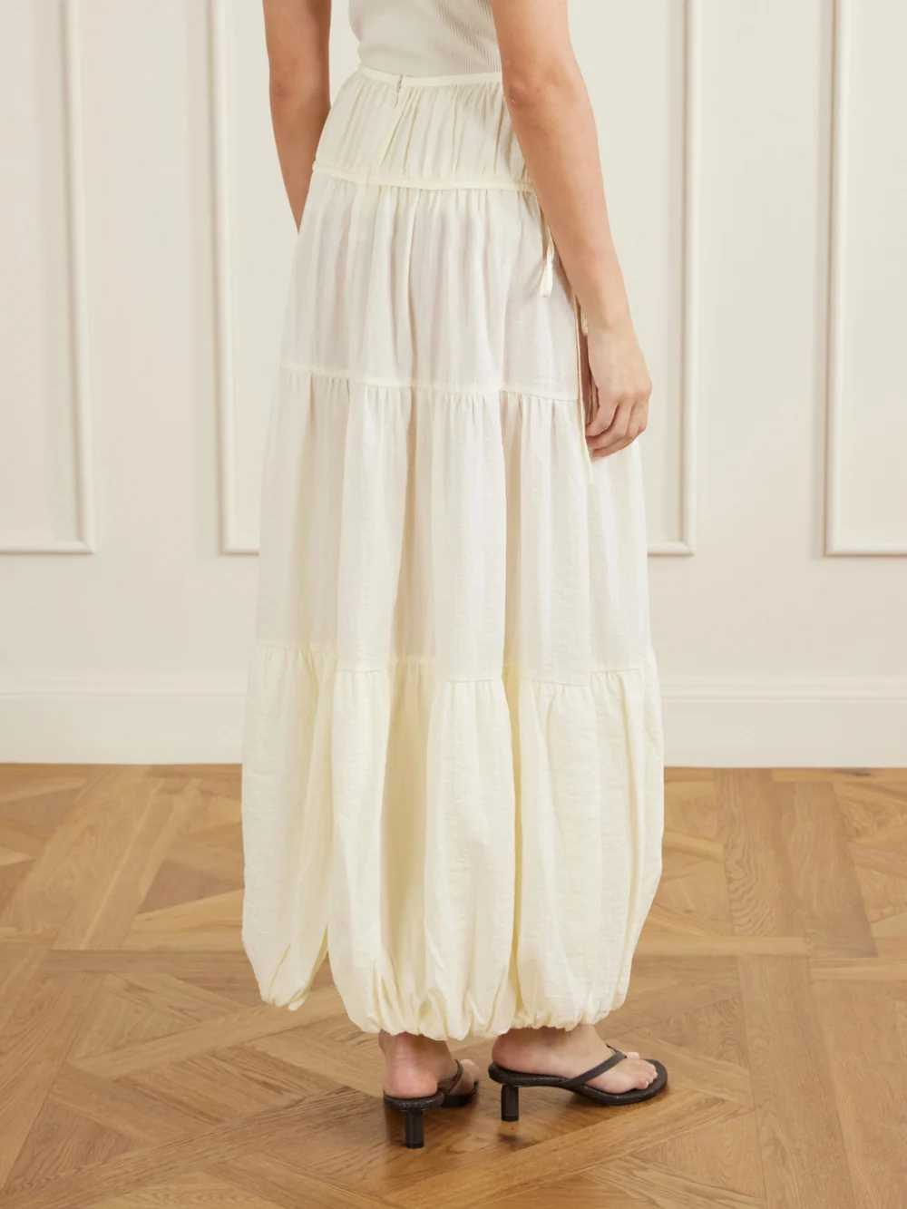 Back view of the Co Gathered Crepe Bubble Maxi Skirt