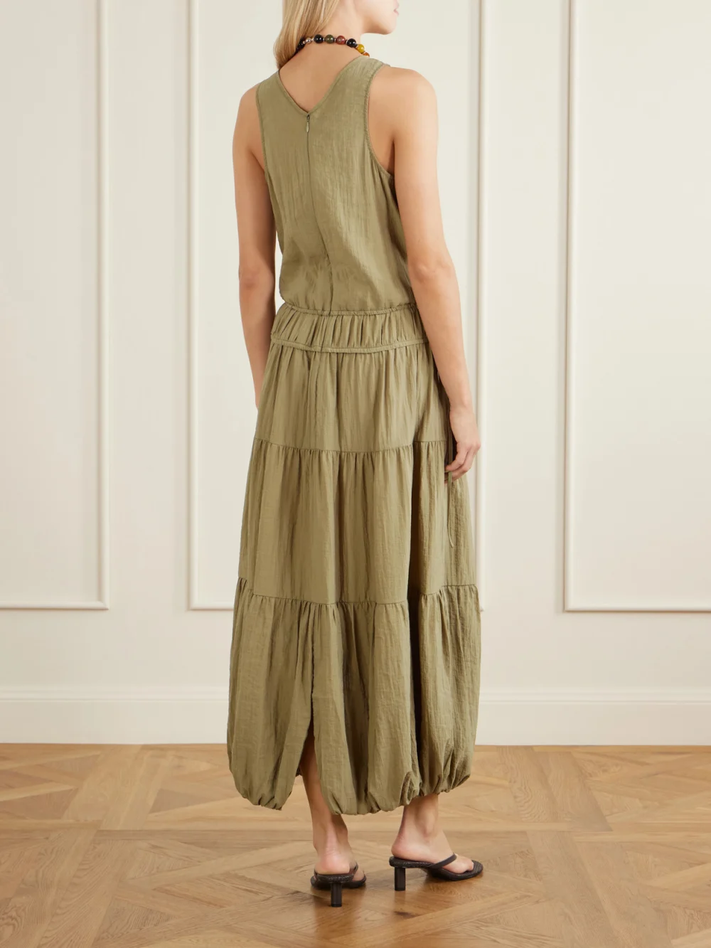 Back view of the Co Pleated Knotted Satin Midi Dress