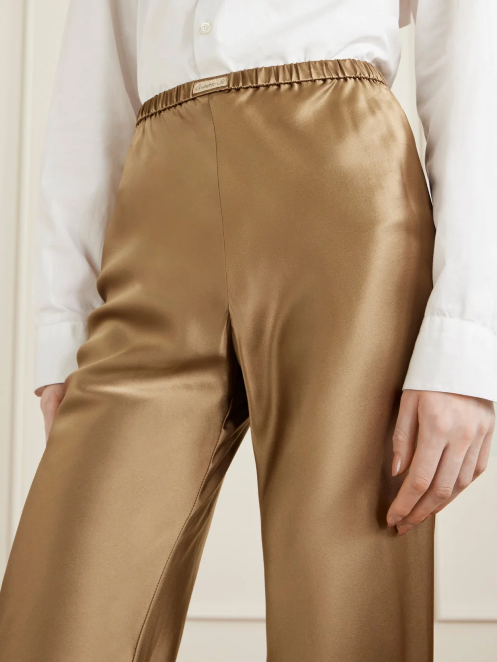 Close-up detail of the Comme Si Silk-bias Straight-leg Pants
