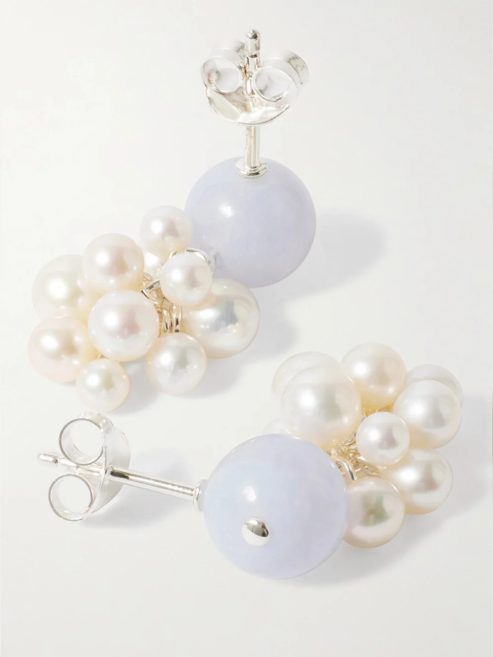Close-up detail of the Completedworks Till the Stars Wane Recycled Silver, Agate and Pearl Earrings
