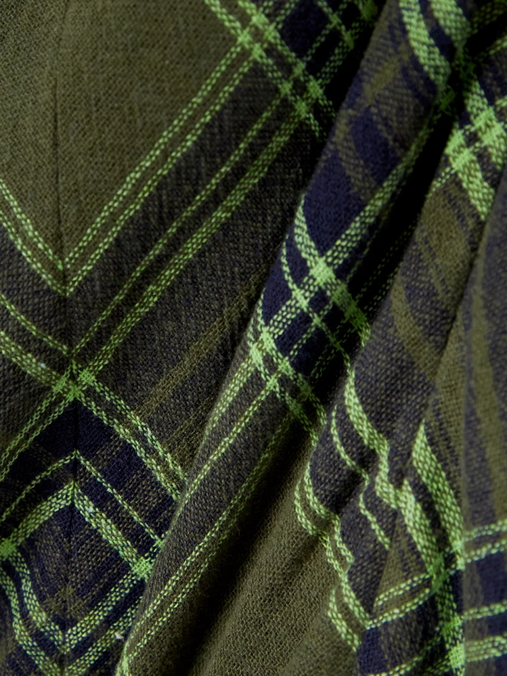 Close-up detail of the Conner Ives Fluted Checked Cotton-blend Gauze Midi Dress