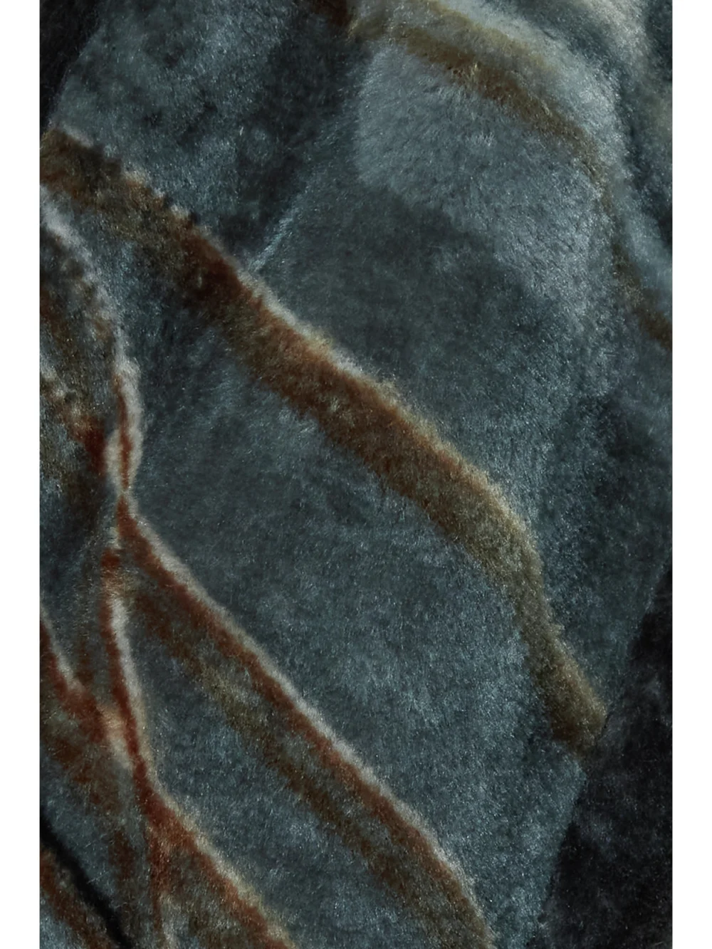 Close-up detail of the Conner Ives + the Vanguard Printed Faux Fur Flared Pants
