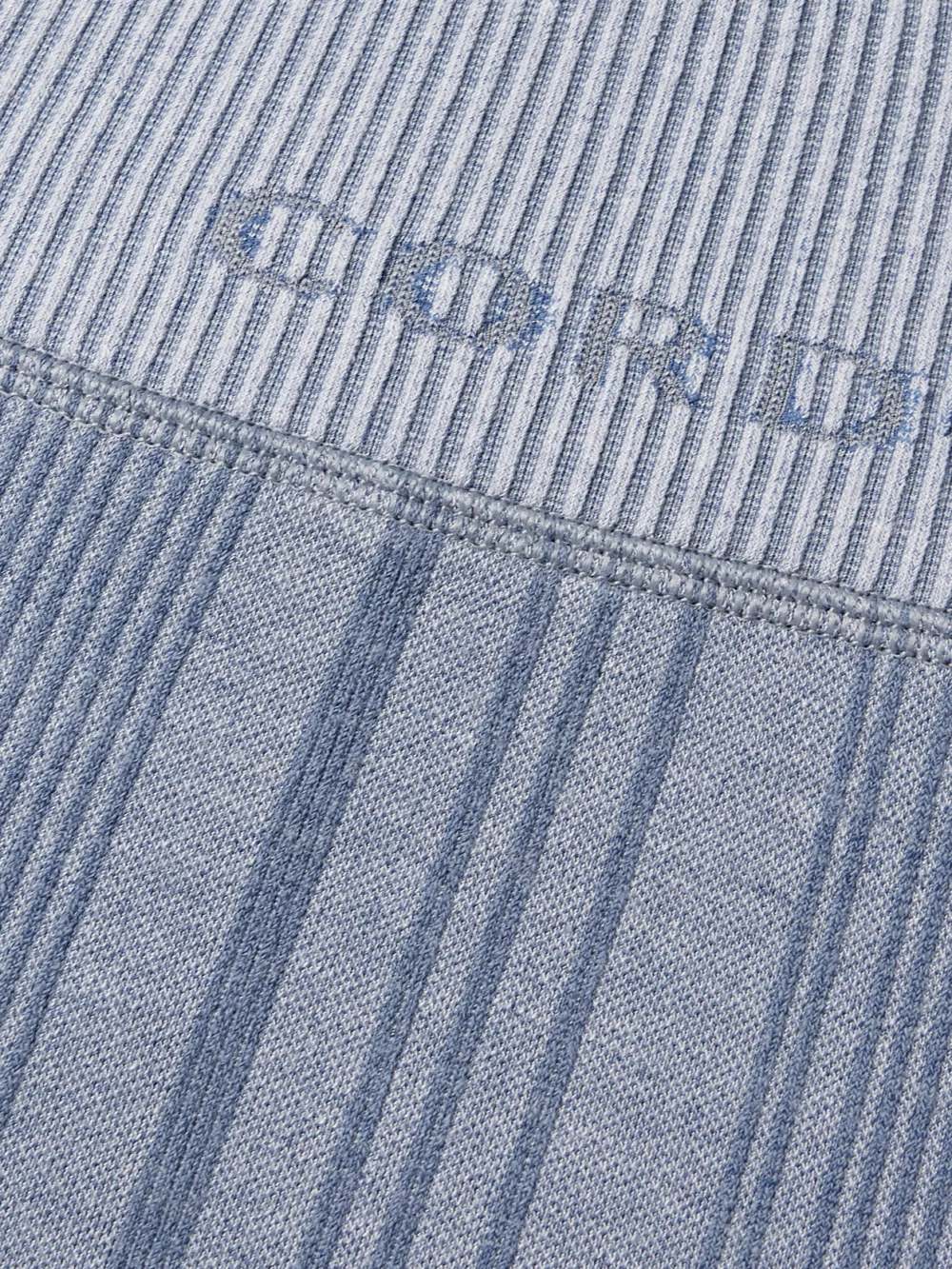 Close-up detail of the Cordova Sol Striped Stretch-jersey Leggings