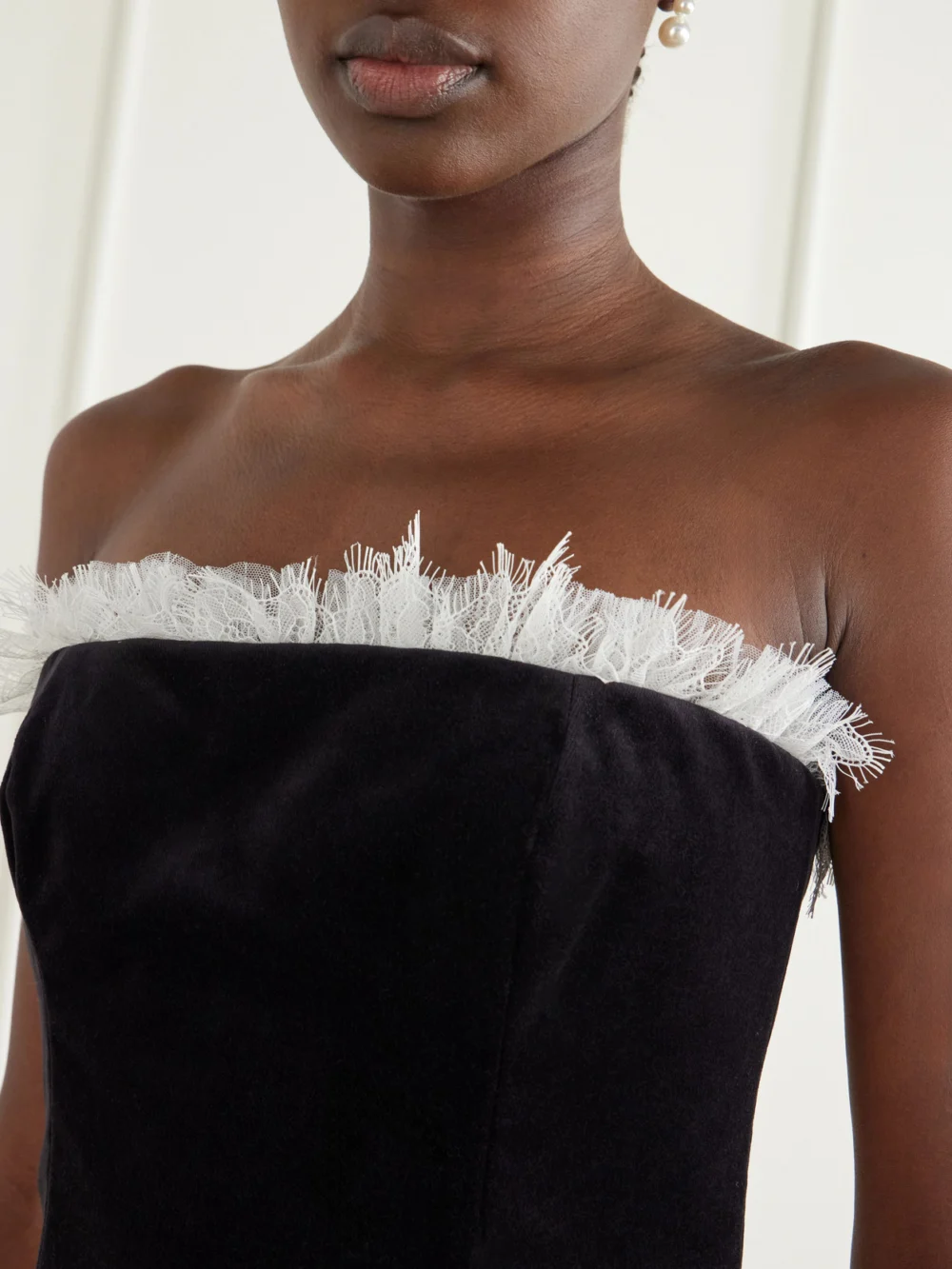 Close-up detail of the Costarellos Isabetta Strapless Tulle and Lace-trimmed Cotton-velvet Midi Dress